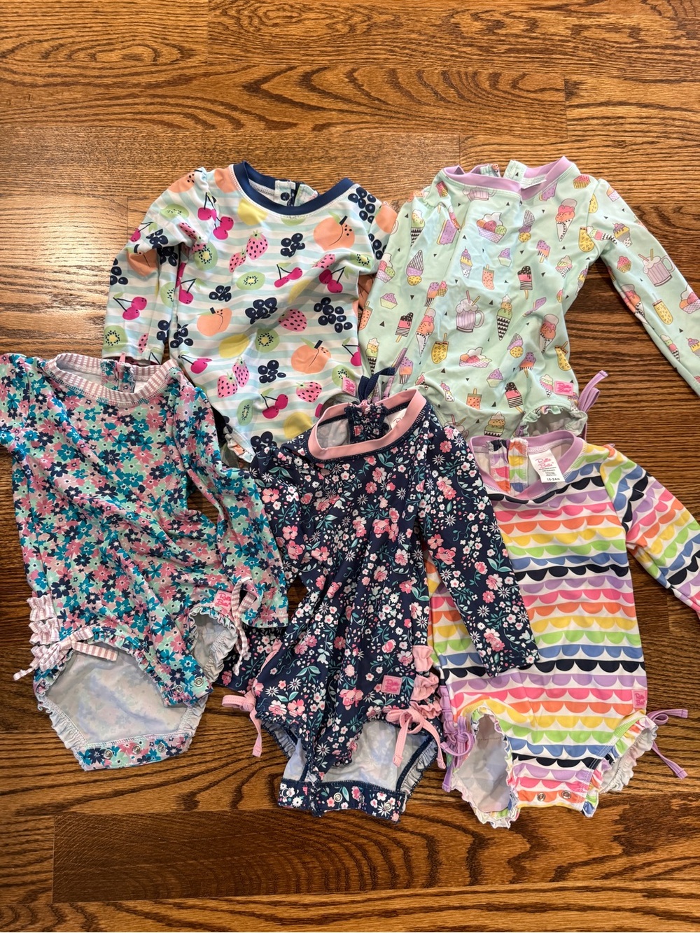 (5) Ruffle Butts long sleeve swimsuits, size 18-24 months
